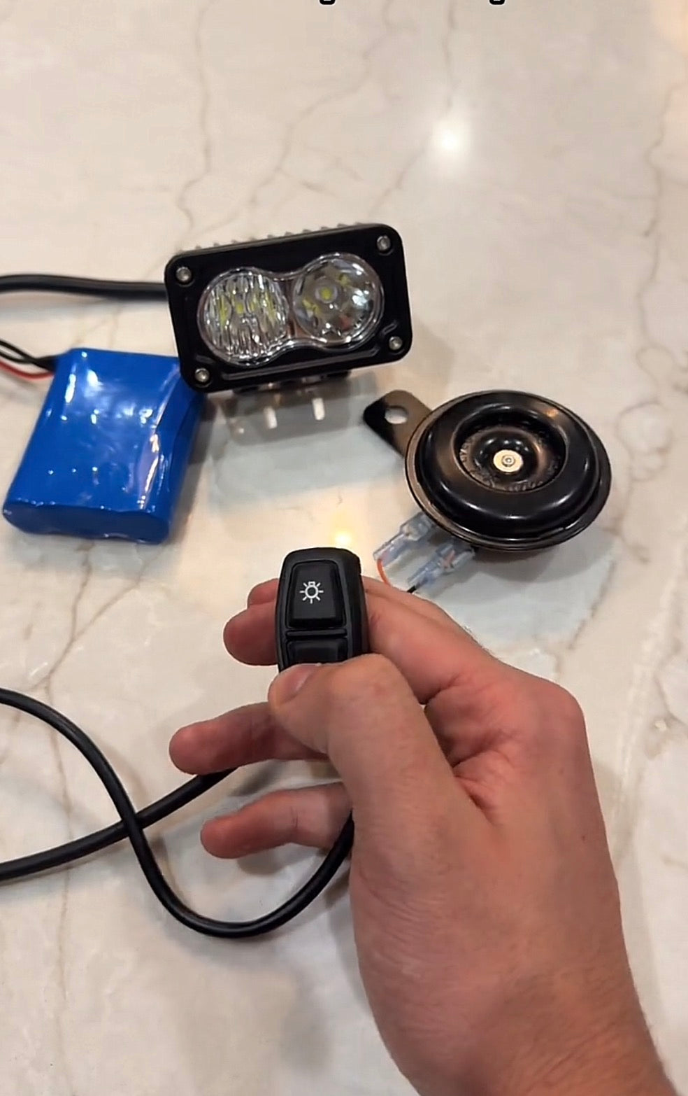 Battery powered horn and light